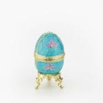 Cloisonne μπιζουτιέρα γαλάζιο αυγό τύπου Φαμπερζέ με μωβ λουλούδια