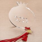 Plexiglass ρόδι με μεταλλικό μοτίφ και κόκκινη φούντα